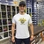CAMISA TXC MASCULINA BRANCA REGULAR MEIA MALHA PENTEADA BORDADA - SELARIA GUIMARÃES