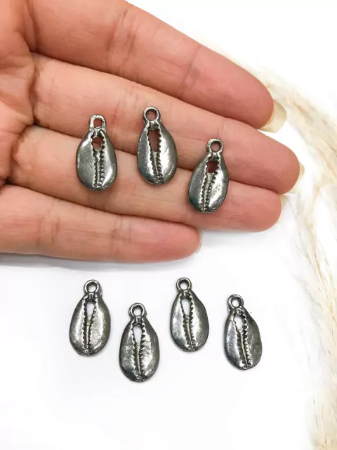 COD 3422 - Pingente Mini Búzios (1.0x1.9cm) Grafite - Unidade