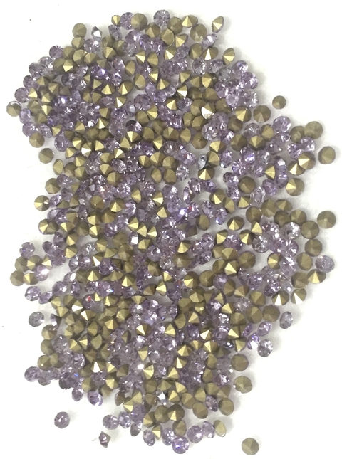 COD 558 - Pedra de Strass SS12/PP24 Lilás - Pacote com 30 pedras.