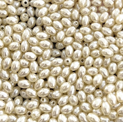 COD 6710 - Pérola de Abs Arroz 6mm Creme - 10 Gramas