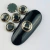 Pedraria de Unha, Olho de Gato, Jet Hematite C/borda Prata 6mm - 20pcs