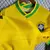 Camisa concept masculina do Brasil 2022 na cor amarela com detalhes do Cristo Redentor e número 10 estampado
