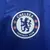 camisa-camiseta-uniforme-titular-home-casa-1-i-azul-do-chelsea-nike-gola-branca-25-26-2025-2026-torcedor-masculina-comprar (1)