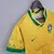 Camisa feminina concept amarela do Brasil 2022 com estampa do Cristo Redentor no peito