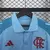 Camisa polo do Flamengo 2025 azul clara masculina, usada pelos atletas, com escudo bordado e detalhes Adidas em branco