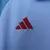 Camisa polo do Flamengo 2025 azul clara masculina, usada pelos atletas, com escudo bordado e detalhes Adidas em branco