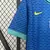 Camisa azul reserva da Seleção Brasileira 2024 com estampa ondulada em tons de azul, escudo da CBF centralizado com cinco estrelas, gola verde e detalhes modernos nas mangas, modelo Nike oficial para a Copa América