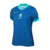 Camisa azul reserva da Seleção Brasileira feminina 2024, modelo Nike com gola em verde claro, escudo da CBF com cinco estrelas e design ondulado moderno em tons de azul