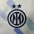 Camisa reserva Inter de Milão 2025/2026 masculina branca Nike, modelo oficial com escudo Inter, patrocínio Betsson e padrão geométrico em azul claro e escuro, para torcedores