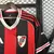 Camisa reserva River Plate 2025/2026 masculina preta e vermelha Adidas, modelo oficial com faixas verticais, escudo do clube e detalhes em branco, para torcedores.