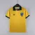Uniforme retrô da Seleção Brasileira de 1988 na cor amarela com gola verde e logo da Topper, modelo clássico e histórico dos anos 80