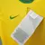 Camisa titular amarela da Seleção Brasileira 2020, com detalhes em verde e escudo da CBF bordado no peito