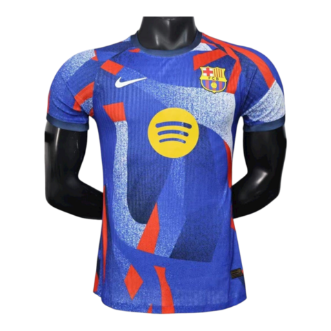 Camisa masculina Barcelona IV 25/26 da Nike nas cores azul e vermelha com logo do clube e símbolo do patrocinador Spotify no centro versao jogador player 
