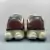 New Balance 9060 Washed Burgundy en internet