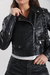Campera Ecocuero cruzada con tachas y cierres en los puños. Art: 7270 en internet