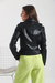 Campera de eco cuero cruzada con cierres, detalle de alforzas en los costados y hebillas en la cintura con diseño. Art: 7273 - TIMOTEA
