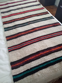 Pie de cama en telar de oveja