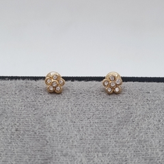 TOPO DE SEGURIDAD FLOR ORO LAMINADO 18K