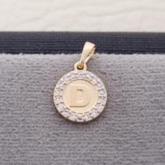 DIJE REDONDO LETRAS CIRCON ORO LAMINADO 18K en internet