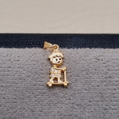 DIJE NIÑO PATIN MICRO SWAROVSKI ORO LAMINADO 18K