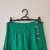 Saia Hit verde bandeira 5 botões laterais crepe babado - Holly Brechó e Outlet