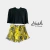 Short saia Hush By Rosana folhagem amarelo preto c/ pompom