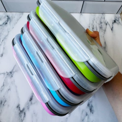 Imagen de LUNCHERA TUPPER PLEGABLE MEDIANA DE SILICONA CON CUBIERTO CUCHARA/TENEDOR