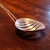 Colar Vasarely em prata com design em forma oval e listras recortadas