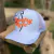 BONÉ COUNTRY STYLE BRANCO DET LARANJA - comprar online