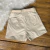 Shorts Saia Mimi com Cinto Off White - 685 na internet