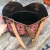 BOLSA FEM GARRUTI EM COURO COM BORDADO PINK na internet