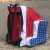 MOCHILA DE TRAÍA TEX TEAM ESTRELAS VERMELHA/AZUL na internet