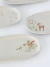 Imagen de KIT X 4 FUENTE OVALADA ORGANICO CELEBRACIONES STONEWARE 23x11CM CHRISTMAS