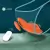 Ilustração de vibrador de calcinha S-Hande Leaf na cor laranja com controle remoto branco, exibindo vibração silenciosa de até 40 decibéis