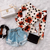 BLUSA PEPLUM THÁIS NO NEOPRENE MANGA LONGA( Estampa POÁ/FLOR)