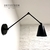 Aplique de pared "PETIT" con movimientos color negro Modelo Large - comprar online