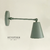Aplique de pared verde inglés "Modelo Petit" múltiples movimientos verticales en 2 sectores