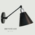Aplique de pared negro con detalles cromados y múltiples movimientos verticales en 2 sectores - comprar online