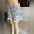 Short jeans claro Zinzane (40) na internet