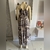 Vestido coqueiro bege Quer Eu Pra Tu (M) - Brechó Quer Eu Pra Tu
