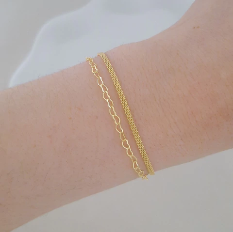 Pulseira dupla coração entrelaçado e fio texturizado