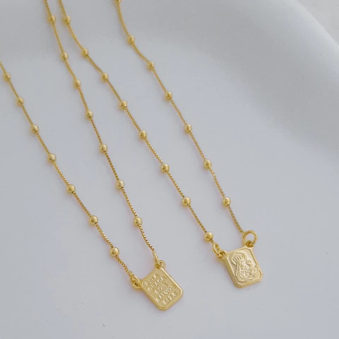 Escapulário religioso com versículo