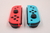 CONTROLE - NINTENDO SWITCH JOYCON VERMELHO E AZUL (1)