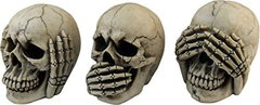 Juego De 3 Figuras Decorativas De Calaveras en internet