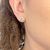 BRINCO PONTO DE LUZ AZUL BANHADO A OURO 18K - comprar online