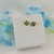 BRINCO PONTO DE LUZ AZUL BANHADO A OURO 18K