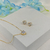 CONJUNTO CORAÇAO CRAVEJADO CRISTAL BANHADO A OURO 18K