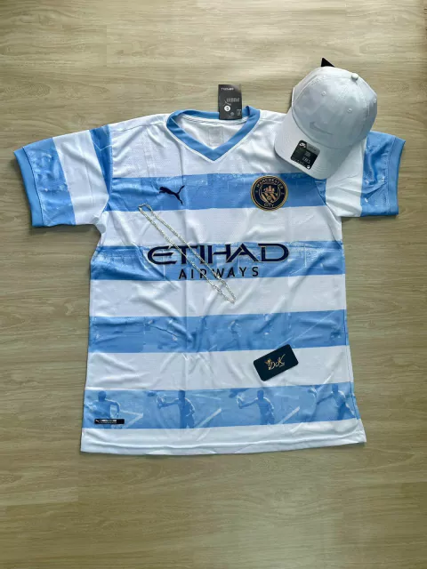 KIT MANCHESTER CITY LISTRADA + BONÉ NIKE BRANCO