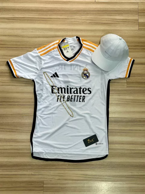KIT - CAMISA NOVA REAL MADRI VINNI JUNIOR + BONÉ AOKLEY BRANCO