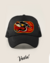 Black trucker hat featuring a colorful dragon design with the text "LIVE FAST DIE LAST" and the brand name "Vudu!"